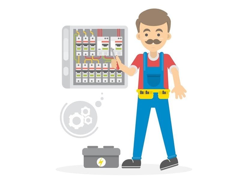 Handyman in overalls points to an open electrical panel with wires and breakers behind him.